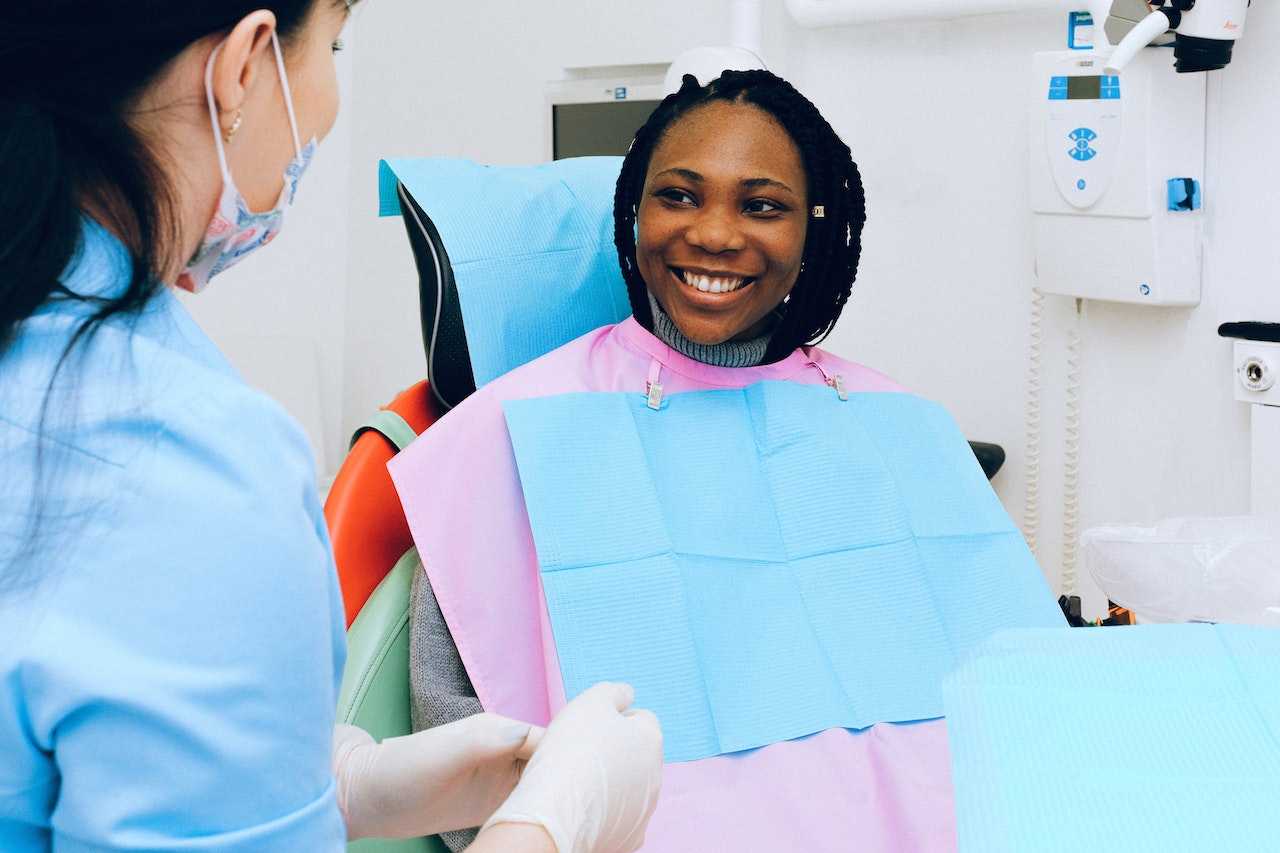 Dentist with Smiling Patient